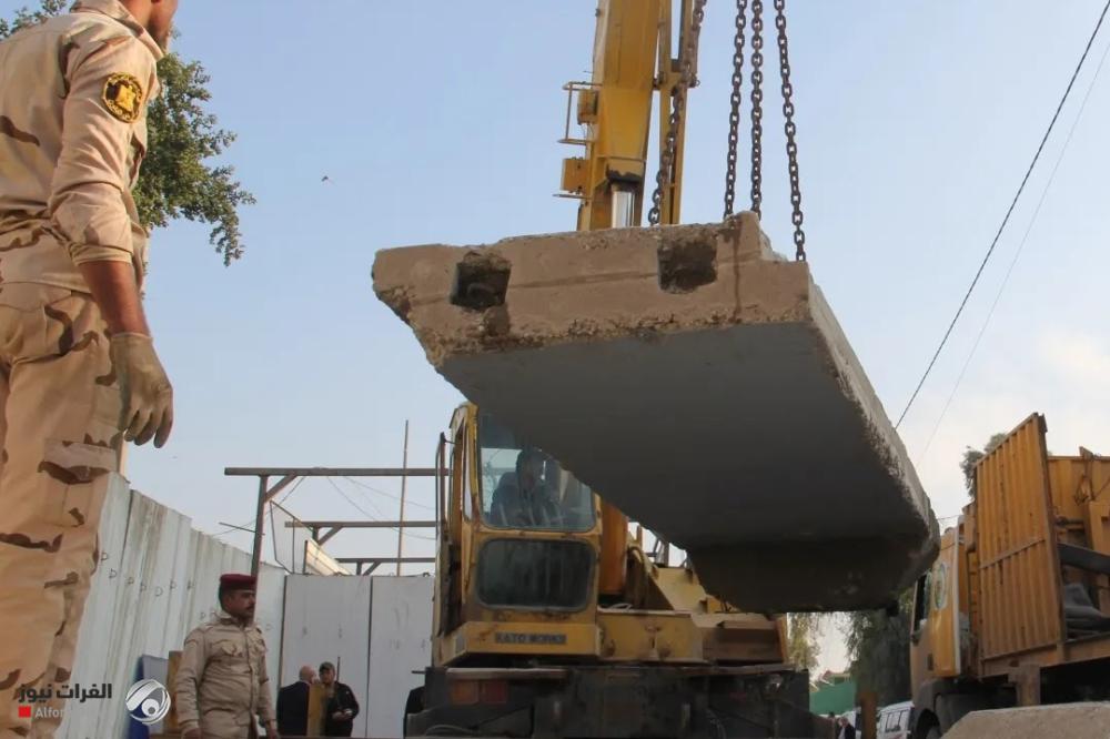 عمليات بغداد ترفع الكتل الكونكريتية من طريق أبي غريب – العامرية