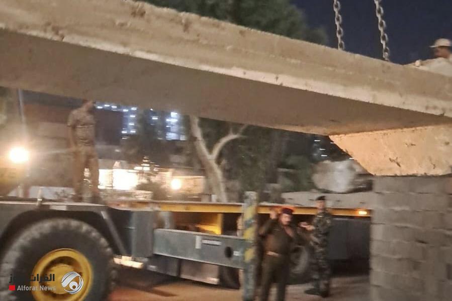 بالصور.. عمليات بغداد ترفع كتلًا كونكريتية عن محيط السفارة الليبية