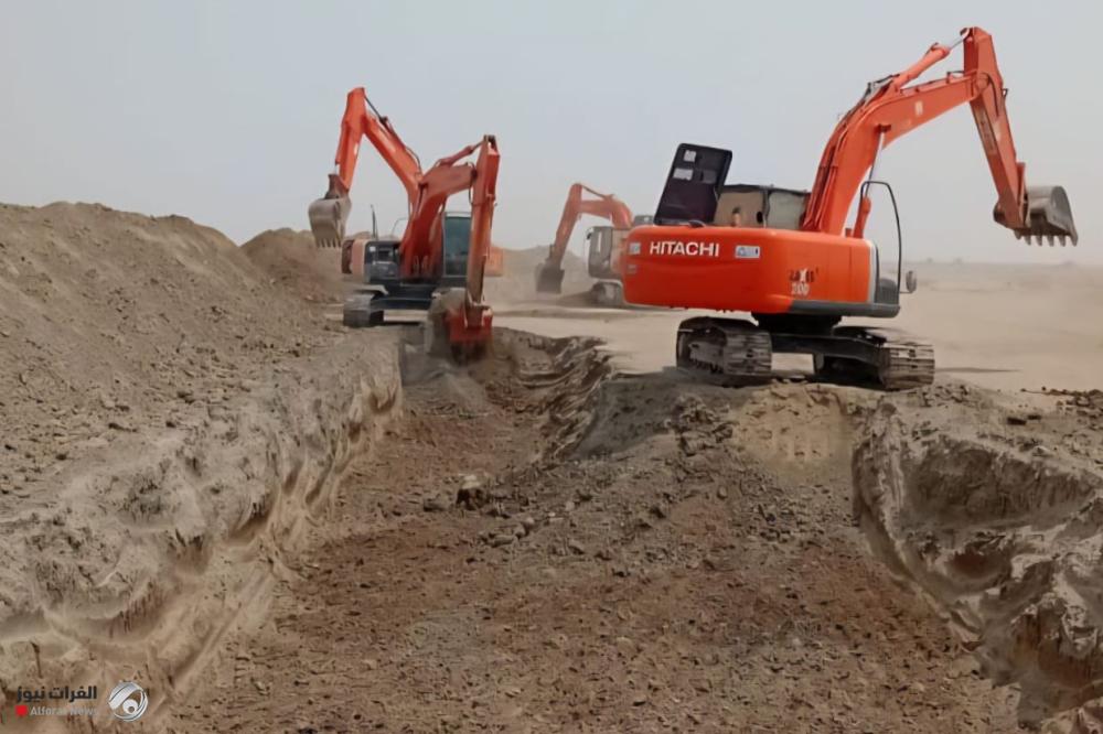 بالصور :الإعمار تحارب الكثبان الرملية لضمان سلامة الطريق السريع بين المثنى وذي قار