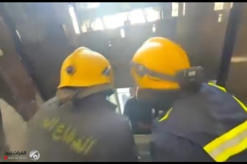 الدفاع المدني في الأنبار ينقذ شخصين علقا داخل مصعد كهربائي