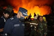الدفاع المدني تعلن السيطرة على حريق اندلع بـ6 مخازن وعجلات حمل في بغداد